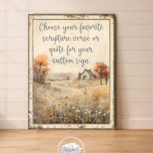 May include: A rectangular sign featuring a landscape illustration of a small house in a field with autumn trees. The text reads: Choose your favorite scripture verse or quote for your custom sign. The sign has a distressed, weathered border.