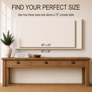 May include: A rectangular wall art display guide featuring the text FIND YOUR PERFECT SIZE and See how these sizes look above a 72" console table. Two white rectangular outlines are shown with labels 48" x 24" and 60" x 30" above a wooden console table.