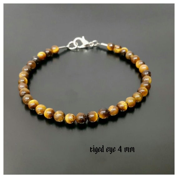 0041 Decorative red and blue beads with tigers eye elastic beaded braclet.
