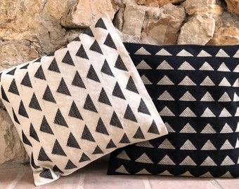 Handwoven contemporary, minimalist decorative pillow cover with ecru base and black geometric brocade designs