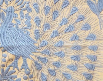 Handwoven and hand-embroidered peacock wall tapestry or table runner in sky blue and beige Fairtrade made by Maya women's cooperative