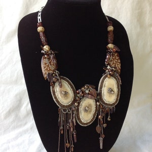 Bead embroidered and free form beaded necklace in neutral colors cream and browns