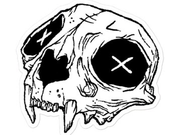 May include: Black and white line drawing of a cat skull with X's over the eye sockets.