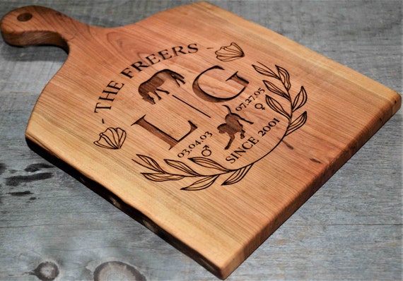 Natural hand crafted solid cherry live edge wood cutting board