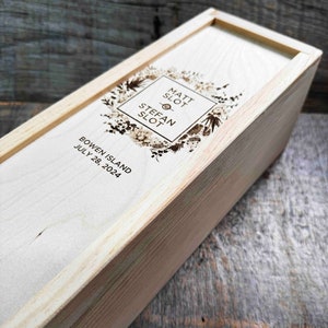 May include: A wooden box with a floral design and the text "Matt Slot - Stefan Slot Bowen Island July 28, 2024" engraved on the lid.