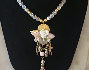 Spectacular assemblage pendant with pink crystal beads