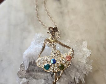 Unique and sparkly ballerina pendant necklace with psve-ser rhinestones, crystals! Whimsical and eye-catching!