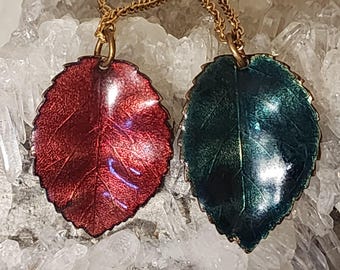 Vintage enamel leaves made into individual pendants from a leaf charm necklace, 1970's. 2 sizes of leaves available. Rich jewel tones!