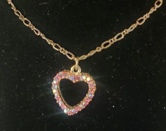 Vintage rhinestone heart necklace and pierced heart earrings.