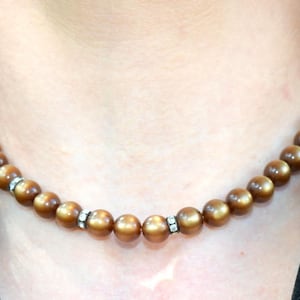 Brown moon glow necklace. Single strand beaded necklace! Rootbeer lucite necklace.