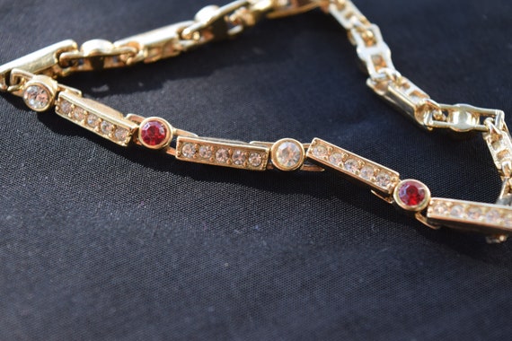 Rhinestone bracelet with red accents gold tone li… - image 5