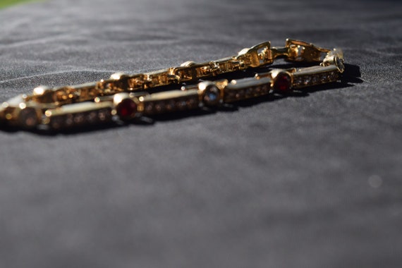 Rhinestone bracelet with red accents gold tone li… - image 7