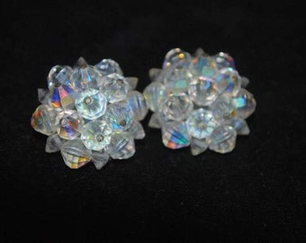 Laguna aurora borealis cluster earrings. Glass bead clip on earrings. Midcentury beaded earrings.