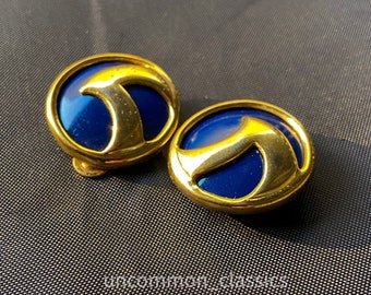 Blue enameled clip on earrings with gold tone design. Vintage earrings.