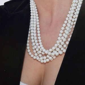 White multistrand beaded necklace with large clasp. Multi strand necklace.