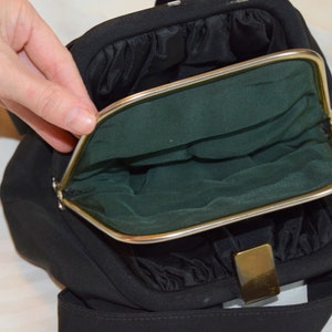 Vintage 1950’s black faille purse with double compartments. Dark green middle compartment. Unique black handbag.