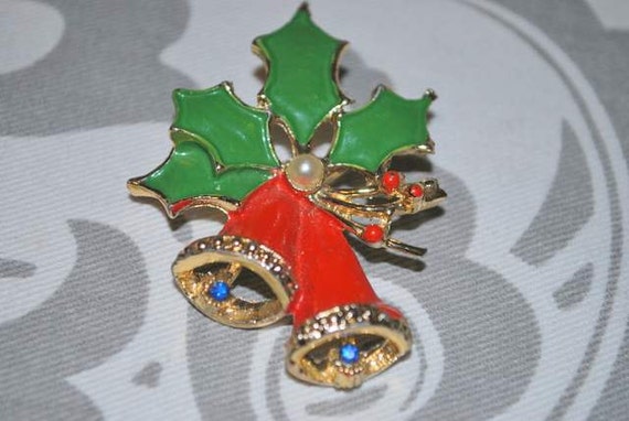Red Christmas bells with blue rhinestone centers! Christmas bells pin. 1970's Red and green holiday bell pin.