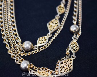 Long chain link with filagree accents. 1970’s necklace Flapper length necklace.