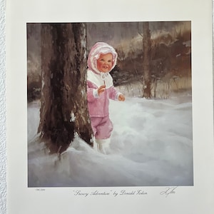 May include: A print titled "Snowy Adventure" by Donald Zolan. The artwork depicts a young child in a pink snowsuit and hood, smiling while playing in the snow near a tree. The print is numbered 585/1990.