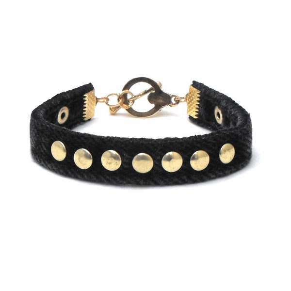 Upcycled black denim bracelet with gold-tone studs and skull toggle clasp, pirate cuff for up to 6.75 inch wrist, gift for goth girl