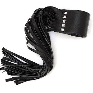 Black leather cuff: 2" wide black bracelet with 13.5" long fringe, medium wrist
