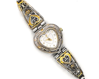 Lady's heart-shaped wristwatch: Western two-tone fashion with stretch band, quartz movement