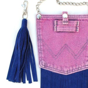A detachable suede tassel adds plenty of pizzazz!