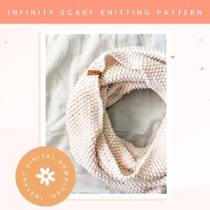 May include: A white infinity scarf knitting pattern, with a digital download label. The scarf is made with a simple stitch and is a great beginner project.