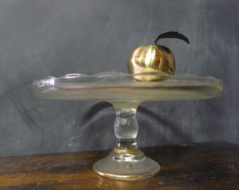 Glass pedestal cake plate with gold edge: Jeannette harp