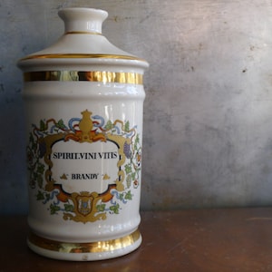 Decorative Paul Masson stoneware brandy decanter