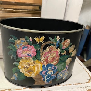 Tin planter with painted floral motif