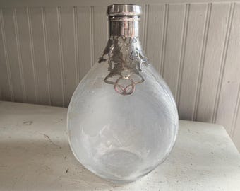 Haig's Pinch decanter with silver overlay