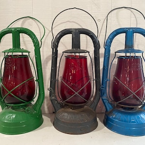 Dietz Monarch oil lantern with red glass (priced per single - choose preferred color).