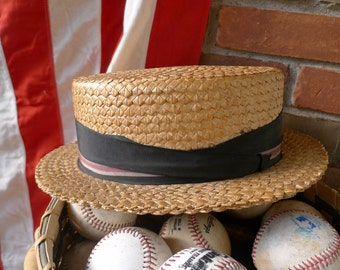 Straw boater hat with striped grosgrain ribbon