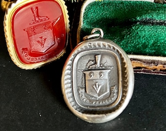 Dulce Periculum, Sweet Danger.  Antique wax letter seal featuring spurs, arrow and riding boots.  Daredevil, fearless, adventure.