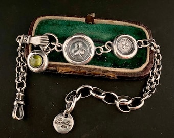 Irish Victorian inspired bracelet.  Sterling silver, handmade bracelet with shamrock charms and a vesuvianite gem.