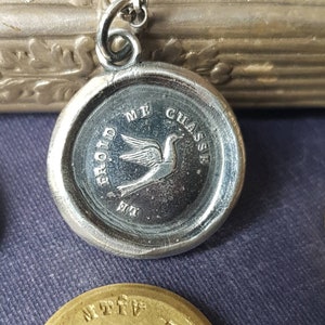 Swallow pendant - antique wax letter seal, handmade wax seal jewelry. The cold chases me away.  French motto, lovely meaningful pendant.