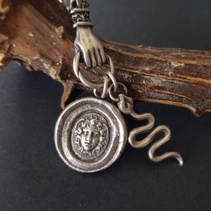 Medusa, snake and hand necklace. Female warrior....Sterling silver with long belcher chain. Handmade medusa necklace