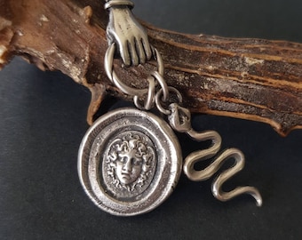 Medusa, snake and hand necklace. Female warrior....Sterling silver with long belcher chain. Handmade medusa necklace