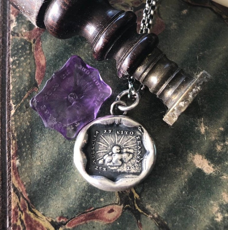 Storms pass and hard times don't last forever..... handmade, sterling, antique wax seal necklace.