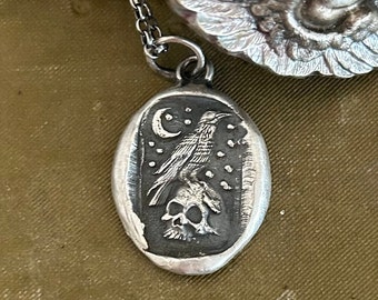 sterling silver, Raven and skull pendant with Moon and stars.