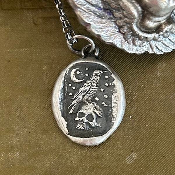 sterling silver, Raven and skull pendant with Moon and stars.