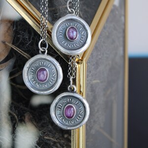 Last ruby.......Nil desperandum, Do not despair, sterling silver pendant with pink ruby.