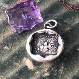 Storms pass and hard times don't last forever..... handmade, sterling, antique wax seal necklace.