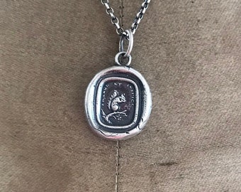 Squirrel antique wax letter seal necklacr.  Sterling silver, 'frange et inspice' 'break and behold'.