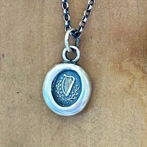 Small antique wax seal pendant.  Irish harp and shamrock.  250 year old wax seal impression. Irish interest.