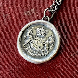 Antikes WachsBuchstabe Siegel 'Essayez' 'Try' bedeutungsvoller inspirierender Schmuck. Heraldik Schmuck, Feature Löwen für Mut.