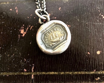 Such is life. Tiny antique wax letter seal pendant.