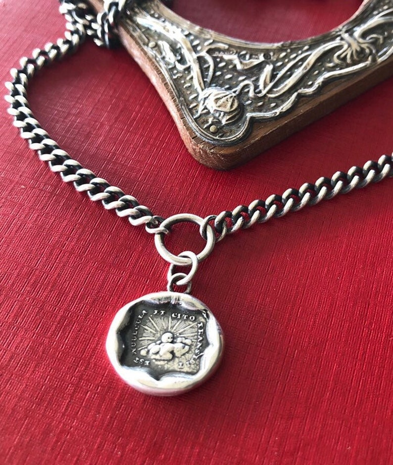 Storms pass and hard times don't last forever..... handmade, sterling, antique wax seal necklace.