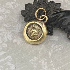 Solid 9 karat yellow gold Fox pendant.